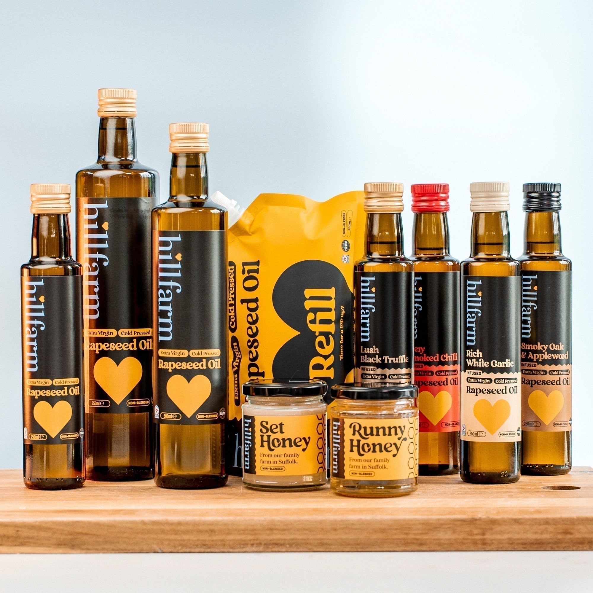 Selection of Hillfarm premium cold-pressed rapeseed oils and honey